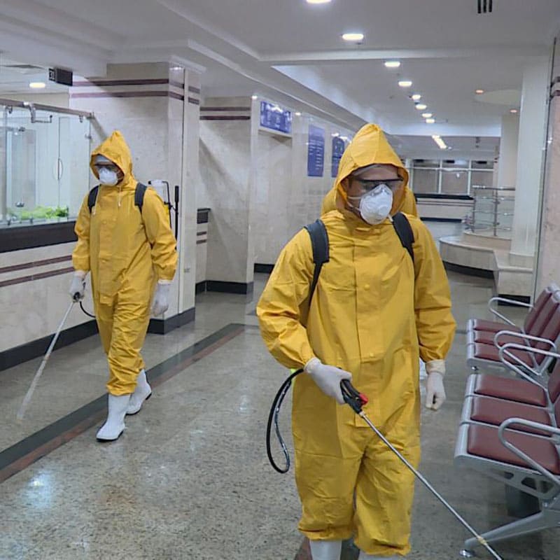 Protective suit yellow color Provides Protection Against Microbes, Viruses, And Chemicals